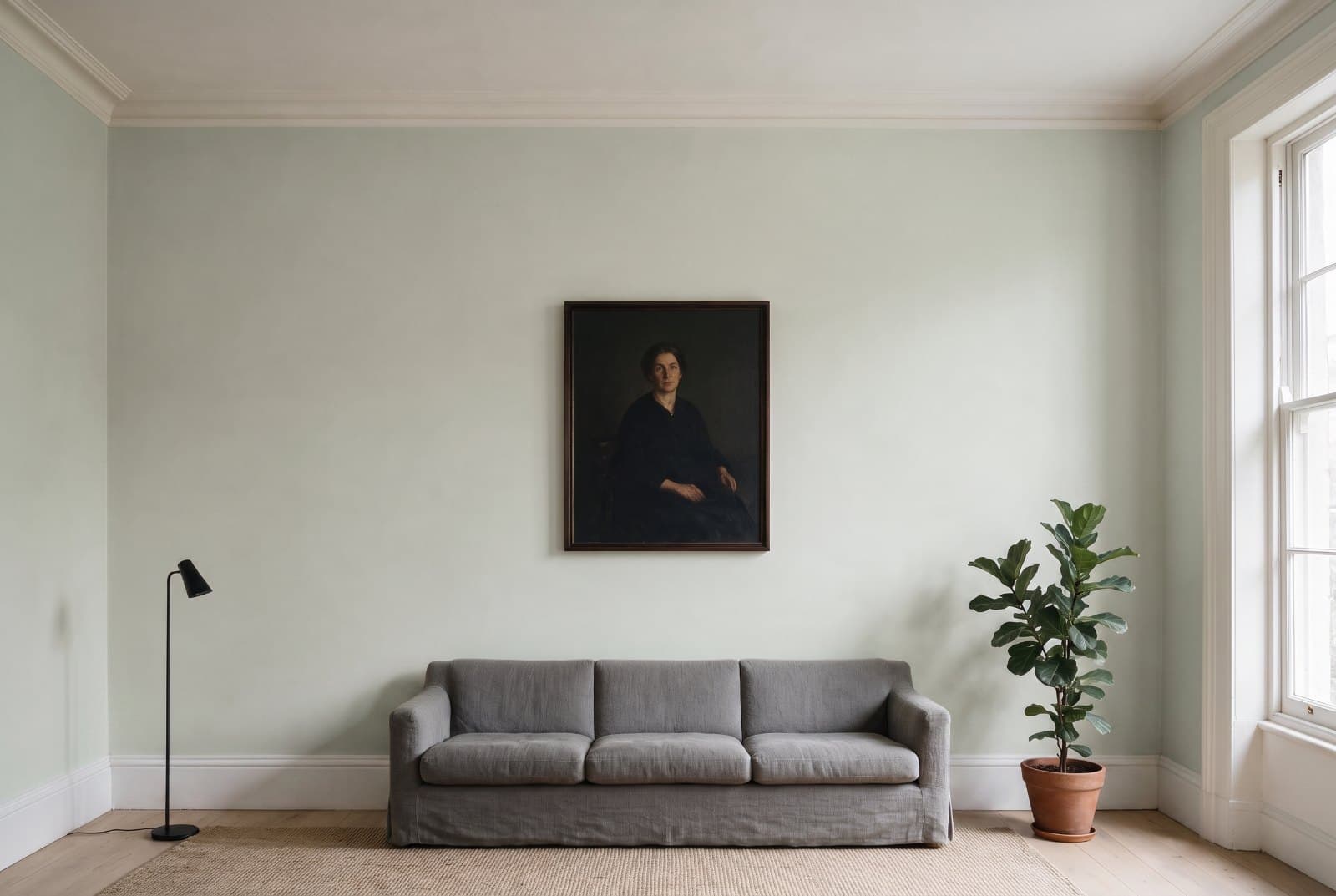 The same living room with the walls repainted in Sherwin-Williams Sea Salt