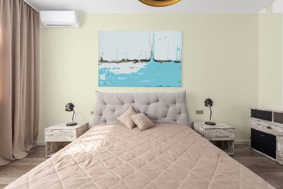 Bedroom wall in SW 6176 Liveable Green, RoomCalm visualizer preview (on-screen approximation)